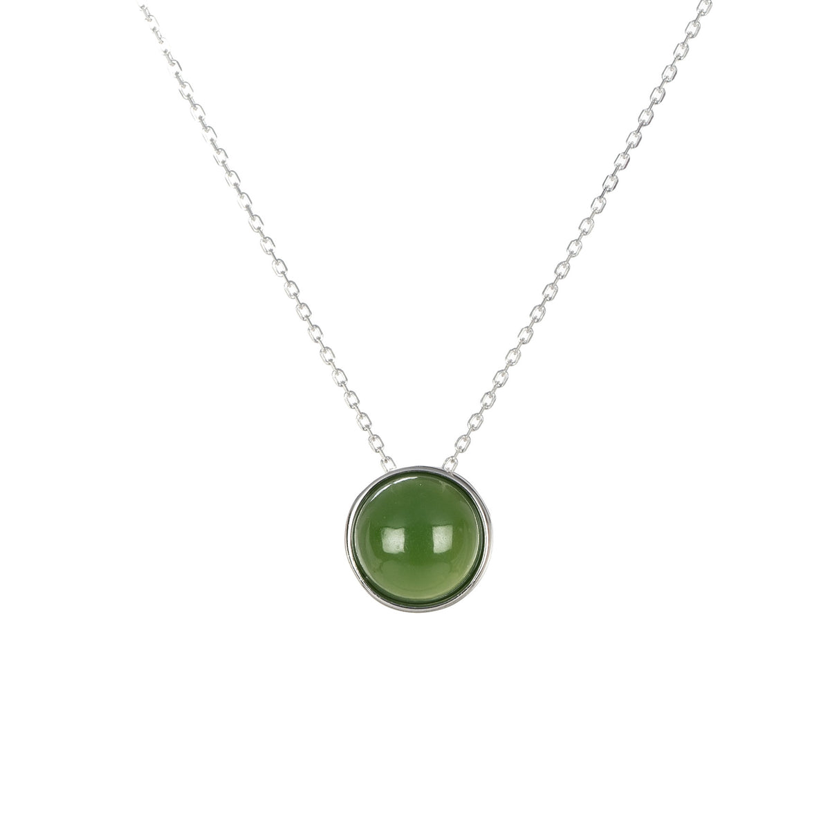 A round cabochon-cut nephrite jade stone pendant in 925 sterling silver bezel setting, with a free silver chain.