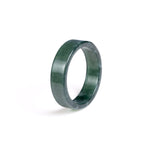 A natural jadeite jade ring in deep green colour positioned on white background.