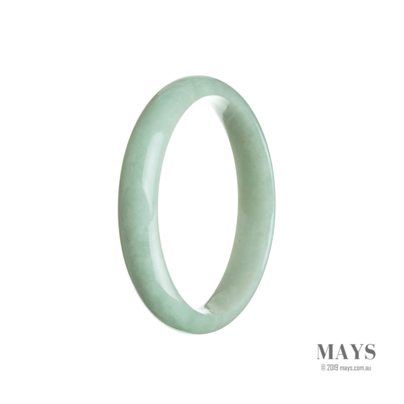 A light green Burmese jade bangle with a half moon shape, measuring 56mm, showcasing genuine Grade A quality.
