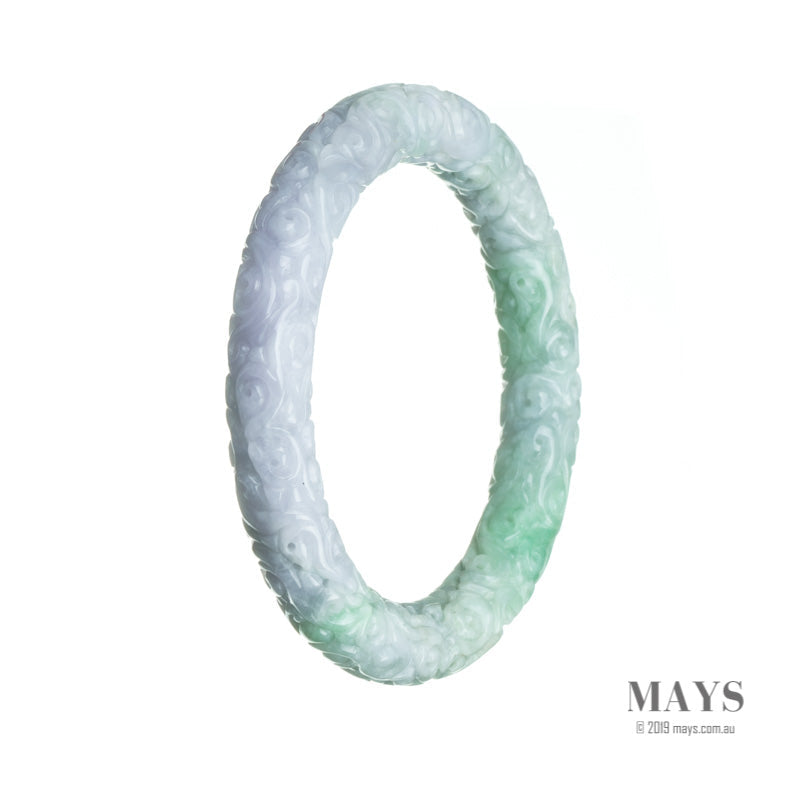 A lavender and green jade bangle with intricate carvings, perfect for adding a touch of elegance and tradition to any outfit.