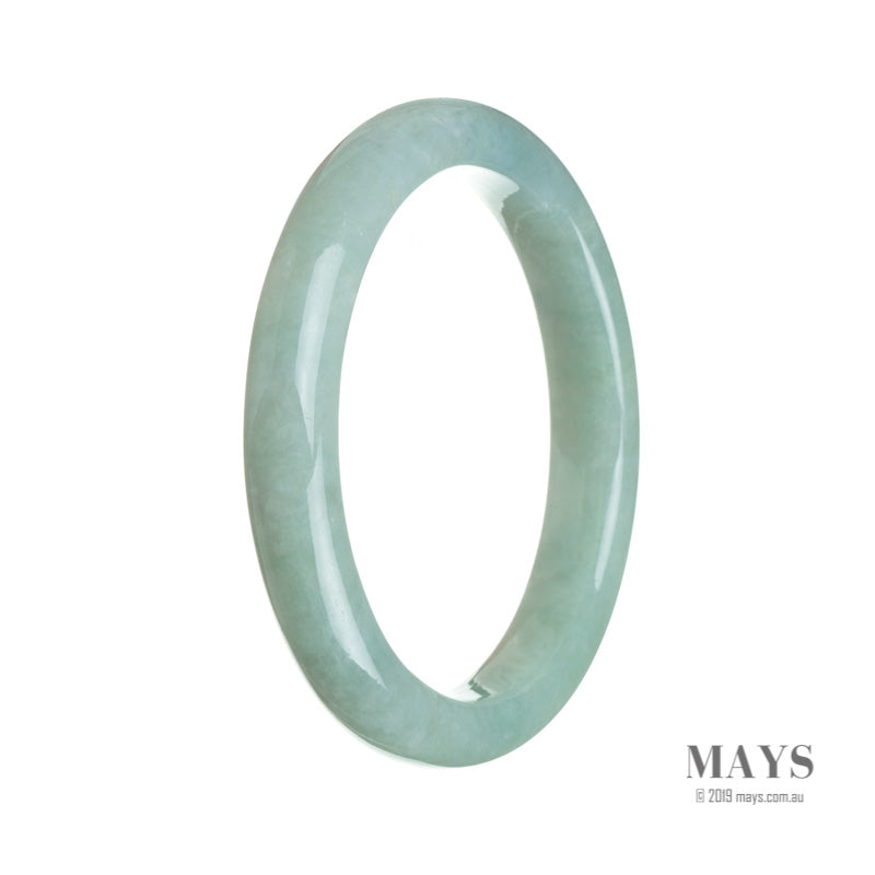 A pale green Burmese jade bangle bracelet with a semi-round shape, measuring 64mm in diameter.