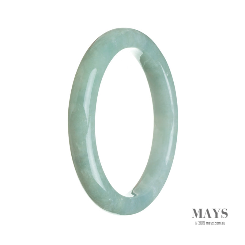 A high-quality, pale green Burmese Jade bangle with a semi-round shape, measuring 64mm in diameter.
