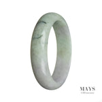 A beautiful half moon-shaped jadeite bracelet in a genuine Type A green color with a subtle lavender hue.