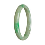 A close-up image of a genuine Type A Green Burma Jade bracelet. The bracelet is 64mm in size and has a semi-round shape. It is a beautiful piece of jewelry from the brand MAYS.