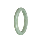 A close-up photo of a beautiful jade bracelet in a half-moon shape, featuring genuine and natural green Burma jade. The bracelet has a smooth and polished surface, showcasing the vibrant green color of the jade. It is a stylish and elegant accessory that would make a perfect addition to any jewelry collection.