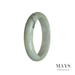 A close-up image of an untreated green with lavender Burma jade bangle bracelet, featuring a half-moon shape. This authentic piece exudes beauty and elegance.