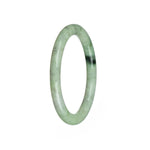 A close-up photo of a beautiful, pale green Burma Jade bangle. The bangle has a petite round shape and features an authentic Type A pattern. It is from MAYS GEMS.