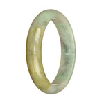 A half moon-shaped pale green and light brown traditional jade bangle bracelet, measuring 59mm in size.
