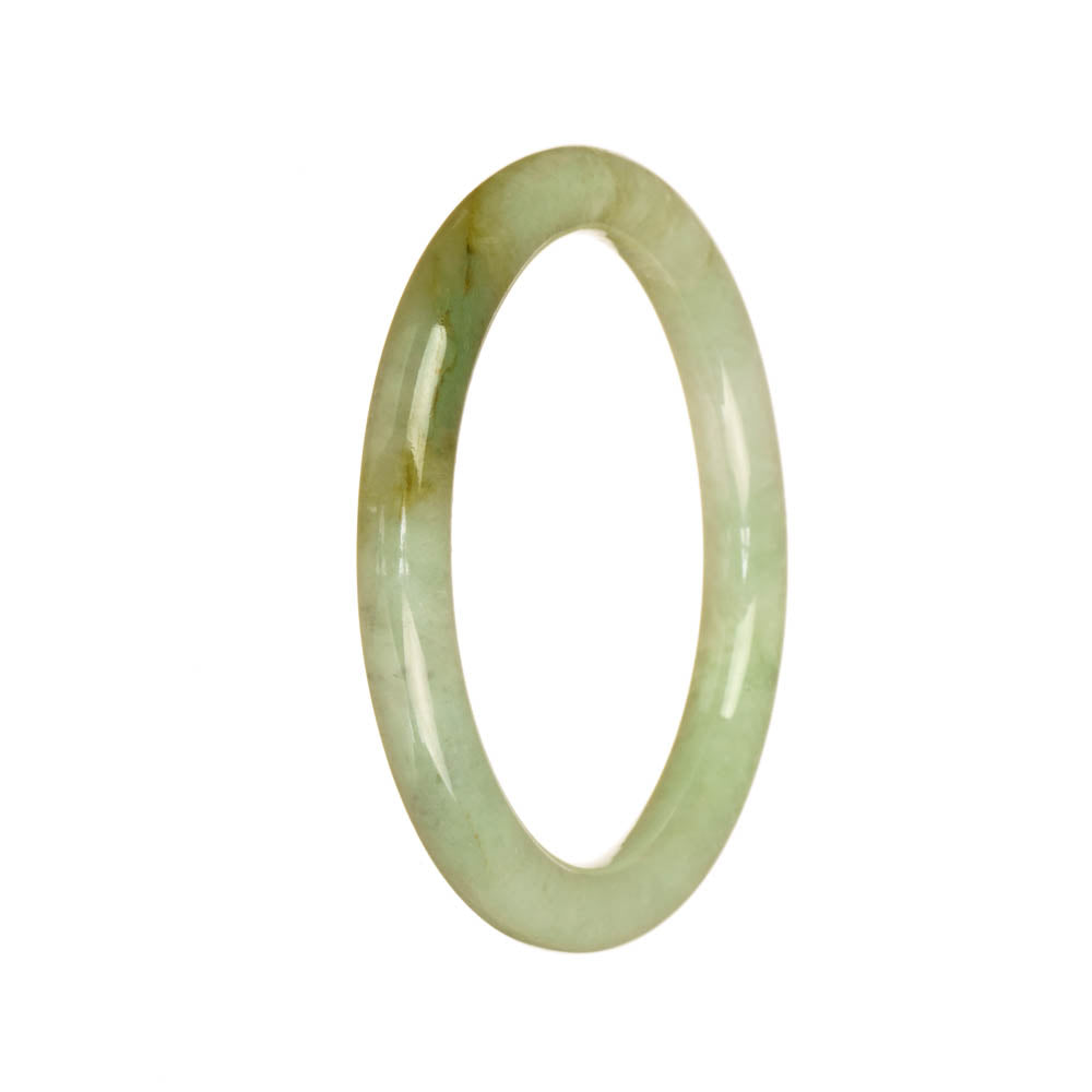 A small, round light green jade bangle made of genuine, untreated jade.