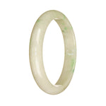 A close-up image of an exquisite Grade A White and Emerald Green Burmese Jade bangle bracelet. The bracelet is in the shape of a half moon and measures 58mm in diameter. The intricate details and vibrant colors make it a truly authentic piece of jewelry.