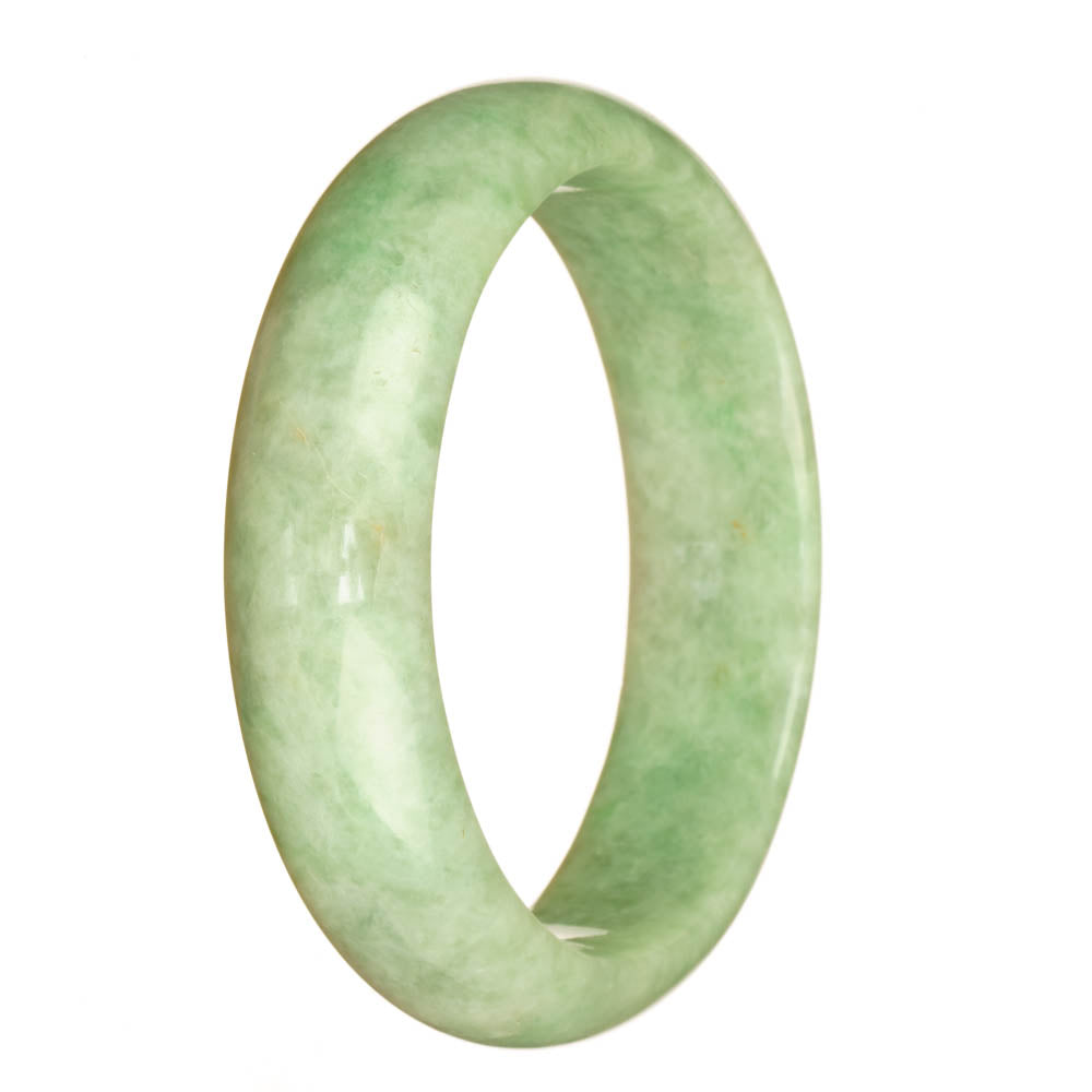 A stunning light green jadeite jade bracelet in a half moon shape, made from authentic Grade A jade. Perfect for adding a touch of elegance to any outfit.