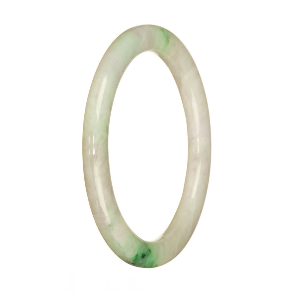 A close-up photo of a white and apple green jadeite bangle. It is a small, round shape with a smooth and polished surface.