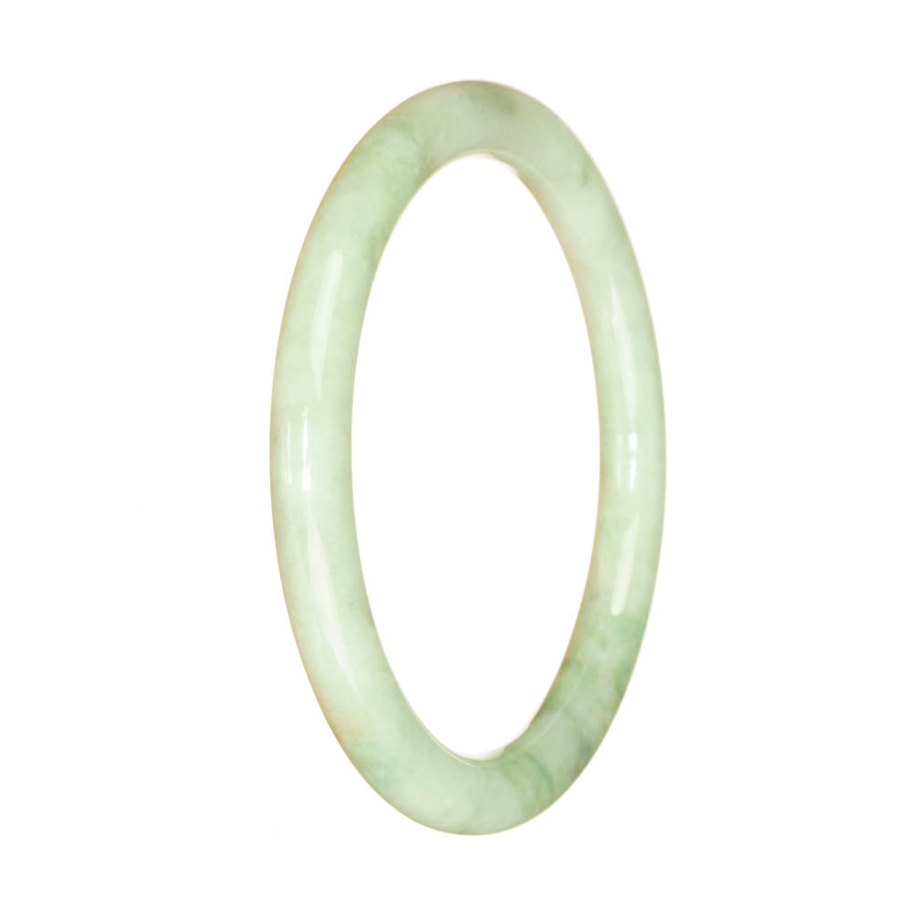 A delicate and elegant light green jadeite jade bracelet, featuring a petite round design measuring 60mm. Crafted with genuine Type A jade, this bracelet adds a touch of sophistication to any outfit.