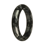 A close-up image of a certified Type A black jade bangle with yellow patches. It has a half-moon shape and measures 62mm in size. Manufactured by MAYS.