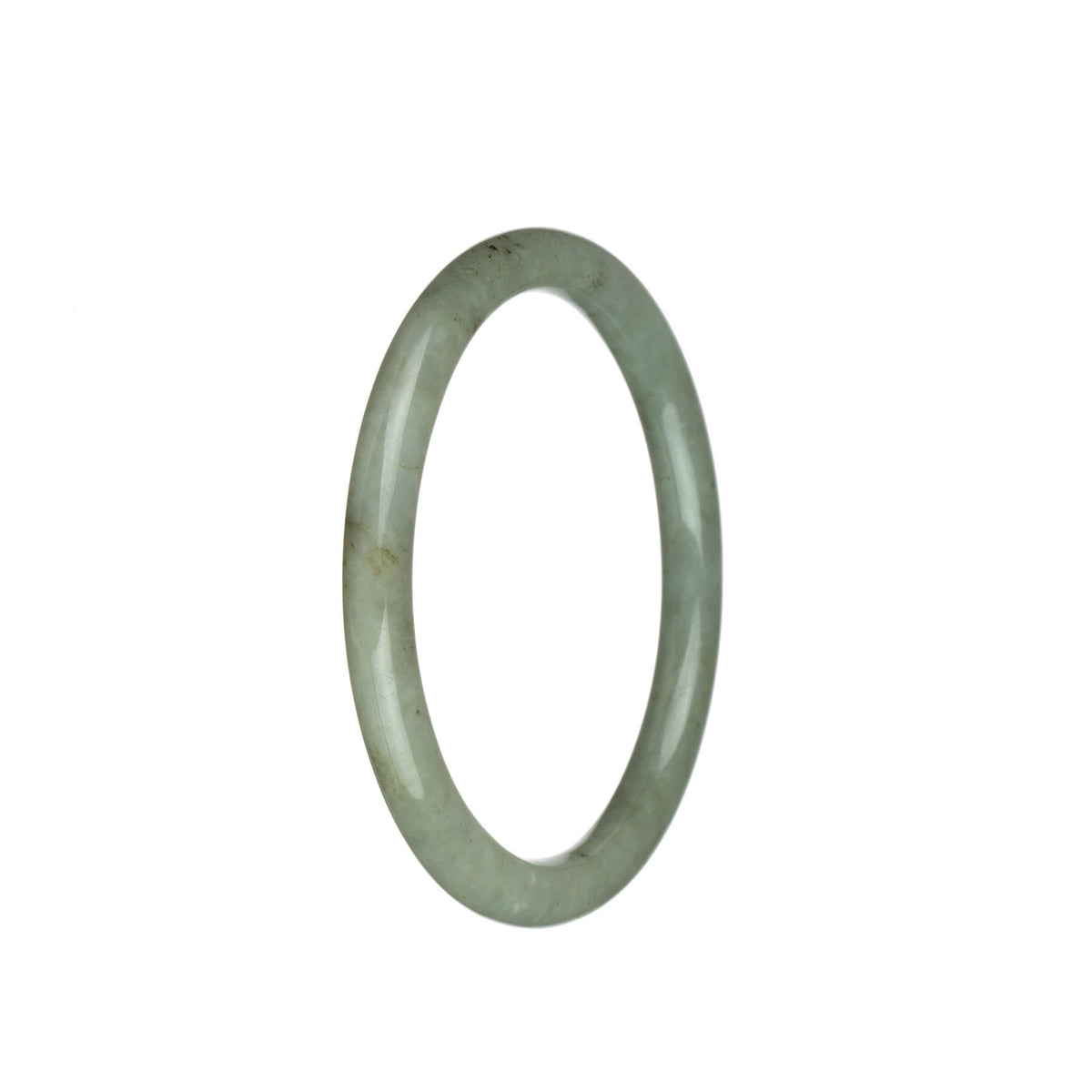 A small, round jade bangle in a delicate pale olive green color.