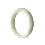 Close-up of a half-moon-shaped green and white jadeite bracelet, showcasing its genuine and natural beauty.
