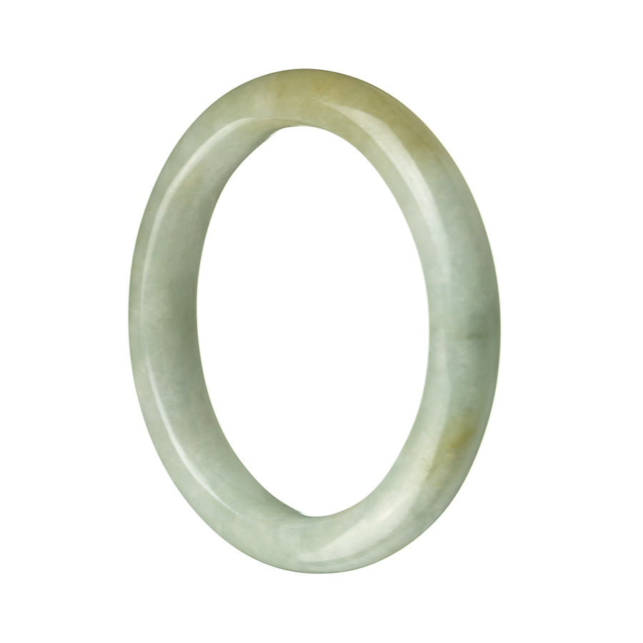 A pale green Burmese jade bangle bracelet with a semi-round shape, measuring 57mm in size.