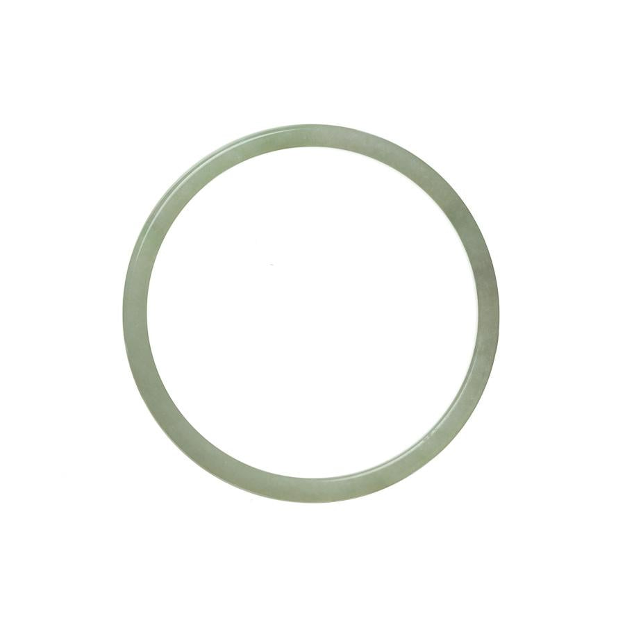 A light green Burmese jade bangle, thin in size, with excellent grade A quality. Perfect for adding a touch of elegance to any outfit.