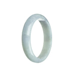 A close-up photo of a bracelet made of authentic Grade A Burma Jade. The bracelet is very pale green with hints of lavender, and it is shaped like a half moon. The size of the bracelet is 56mm. It is a beautiful piece of jewelry from MAYS GEMS.