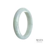 A stunning real grade A jade bangle with a very pale green color, delicately complemented by hints of lavender. The bangle is in a 60mm half moon shape, making it a unique and elegant piece. Perfect for adding a touch of sophistication to any outfit. From MAYS GEMS.