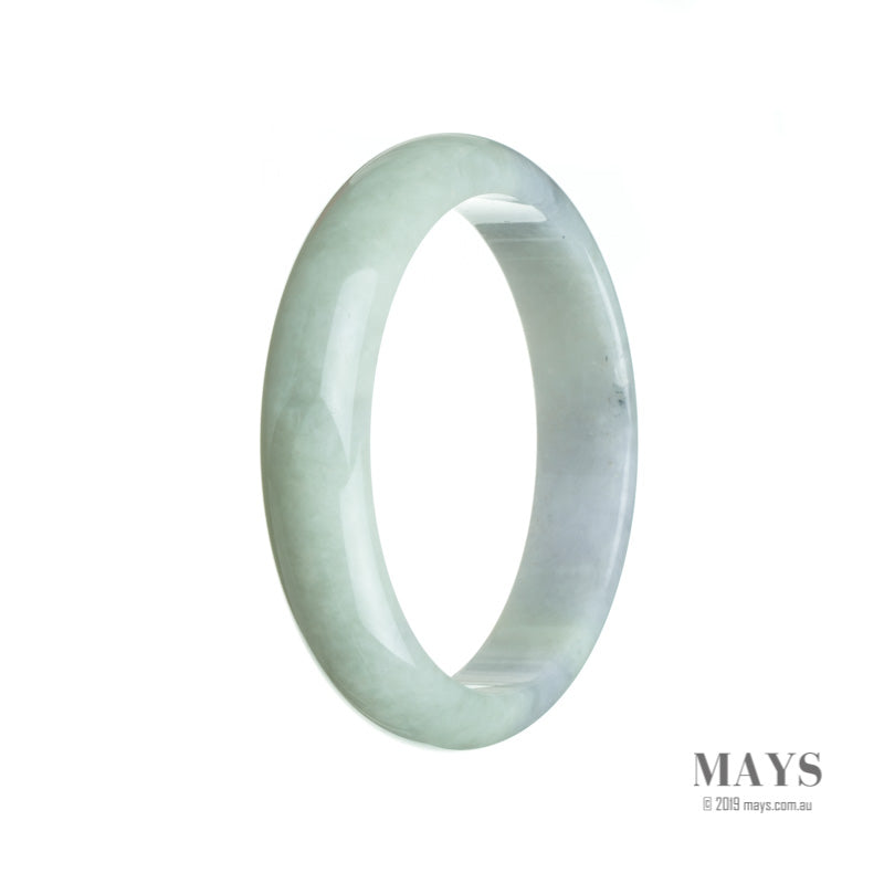 A close-up image of a pale green jadeite bangle bracelet with hints of lavender color. The bracelet has a half-moon shape and is made of authentic Grade A jadeite.
