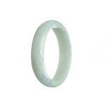 A stunning oval-shaped Burmese Jade bangle bracelet with a pale green color and subtle hints of lavender. The bracelet is made from genuine Grade A jade and measures 58mm in size. Perfect for adding an elegant touch to any outfit.