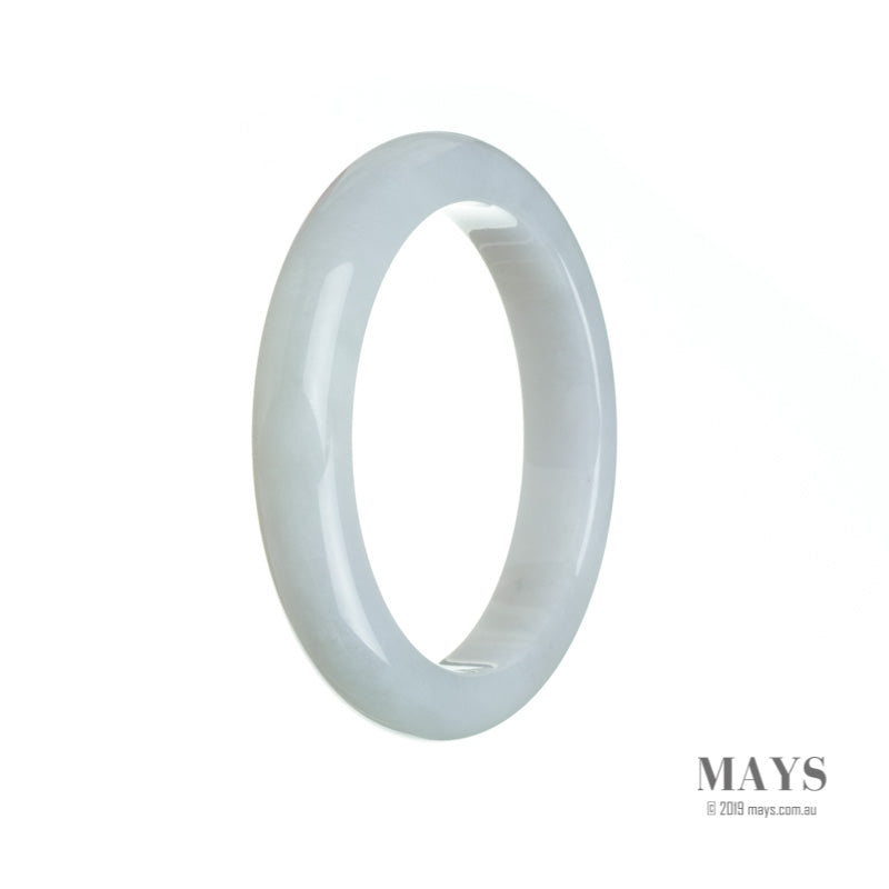 A pale lavender jadeite bangle with a genuine grade A quality. The bangle has a semi-round shape and measures 56mm in diameter. Perfect for adding a touch of elegance to any outfit.