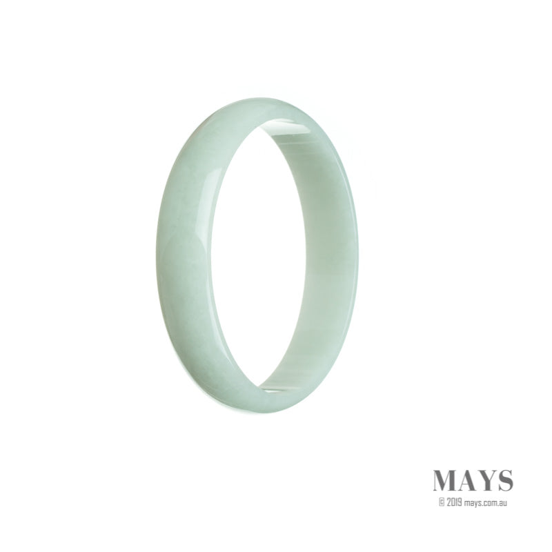 A pale green Burma Jade bangle bracelet with a flat design, showcasing its authentic and natural beauty. Perfect for adding a touch of elegance and serenity to any outfit.