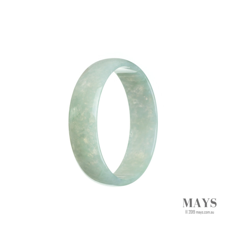 An elegant, pale green Jadeite Jade bangle with a flat design, certified as Grade A quality. Perfect for adding a touch of natural beauty to any outfit.