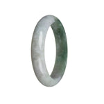 A half-moon shaped bangle made of authentic untreated green Burma jade, measuring 58mm. Exquisite craftsmanship by MAYS.