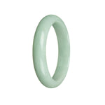 A light green jade bangle with a half-moon shape, measuring 59mm in diameter. This bangle is made of authentic Grade A jade and is sold by MAYS GEMS.