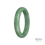 A close-up photo of a stunning green Burmese Jade bangle bracelet with a half-moon shape, measuring 58mm in diameter. The smooth and glossy surface showcases the high quality of the Grade A jade, reflecting light beautifully. The bracelet is a timeless piece of jewelry that exudes elegance and sophistication. Perfect for adding a touch of luxury to any outfit.