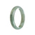 A beautiful light green jade bracelet with a 55mm half moon design. Perfect for adding a touch of elegance to any outfit.