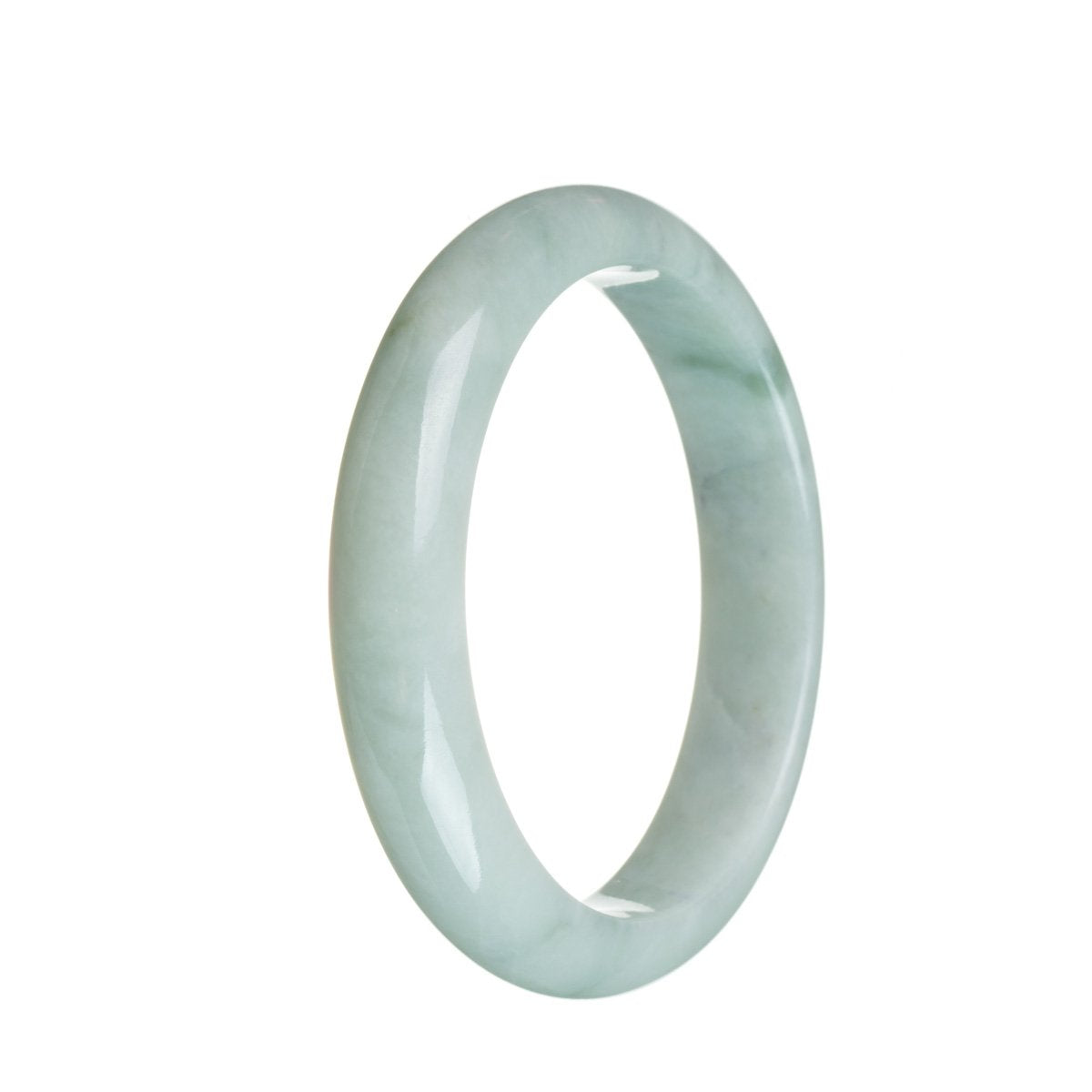 A close-up of a pale green Burmese jade bangle bracelet, showcasing its exquisite craftsmanship and half moon shape.