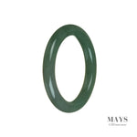 A round, green Burmese jade bangle with a unique pattern.