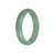 A green jade bangle bracelet with a semi-round shape, made from genuine Grade A jade. The bracelet has a diameter of 58mm and is known for its traditional design. The brand MAYS™ is associated with this item.