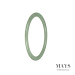 Close-up of a delicate, green Burma jade bracelet with a 59mm thin band.
