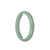 A light green jade bangle bracelet with a half moon shape, certified as Grade A quality.