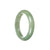 A close-up image of a green jade bracelet with a half moon shape, measuring 55mm in size. The bracelet is made of real Type A green jade and is from the MAYS GEMS collection.