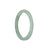 A light grey traditional jade bangle with a half moon shape, measuring 56mm in size.