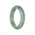 A half-moon shaped lavender Burmese jade bangle, untreated and genuine, offered by MAYS GEMS.