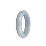 A close-up of a half moon-shaped lavender Burma jade bracelet, showcasing its natural and untreated beauty.