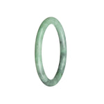 A small, round jadeite jade bangle bracelet in shades of green and grey.