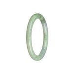 A small round jade bangle bracelet in light green with hints of white and lavender, untreated and sourced from Burma.