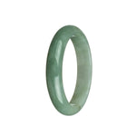 A close-up of a half-moon shaped traditional jade bracelet in shades of greyish green and white. The bracelet is made of genuine Grade A jade and measures 59mm in diameter.