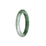 A dainty round bracelet made of authentic green and white jadeite, measuring 54mm in size. Perfect for adding a touch of elegance to any outfit.