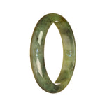 A close-up photo of an elegant green patterned jade bracelet, shaped like a half moon. The jade is of high quality, with a smooth and polished surface. The bracelet is a beautiful piece of jewelry, perfect for adding a touch of sophistication to any outfit.
