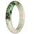 A close-up photo of a beautiful bangle bracelet made of authentic untreated Burma Jade. The bracelet features a unique white and green pattern resembling a half moon shape. It has a diameter of 67mm and is from the brand MAYS.