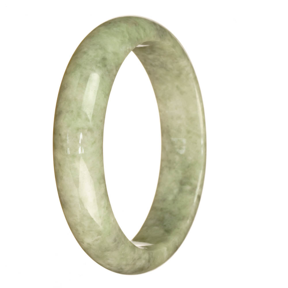 A beautiful grey patterned Burmese jade bracelet with a half moon shape, perfect for adding a touch of elegance to any outfit.