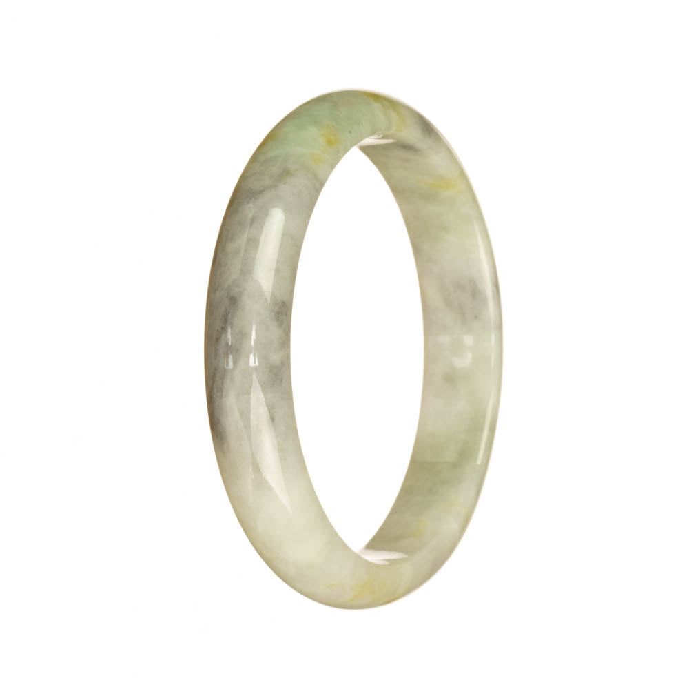 A half moon-shaped Burmese Jade bangle in a stunning combination of white, grey, and pale green colors. This certified Grade A jade piece measures 56mm in diameter and is a beautiful addition to any jewelry collection.